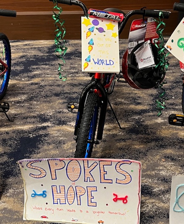 A bike that will be donated has been decorated by one of the teams during the wheels for the world team building event