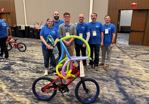 A decorated bike that will be given away during the team building event wheels for the world